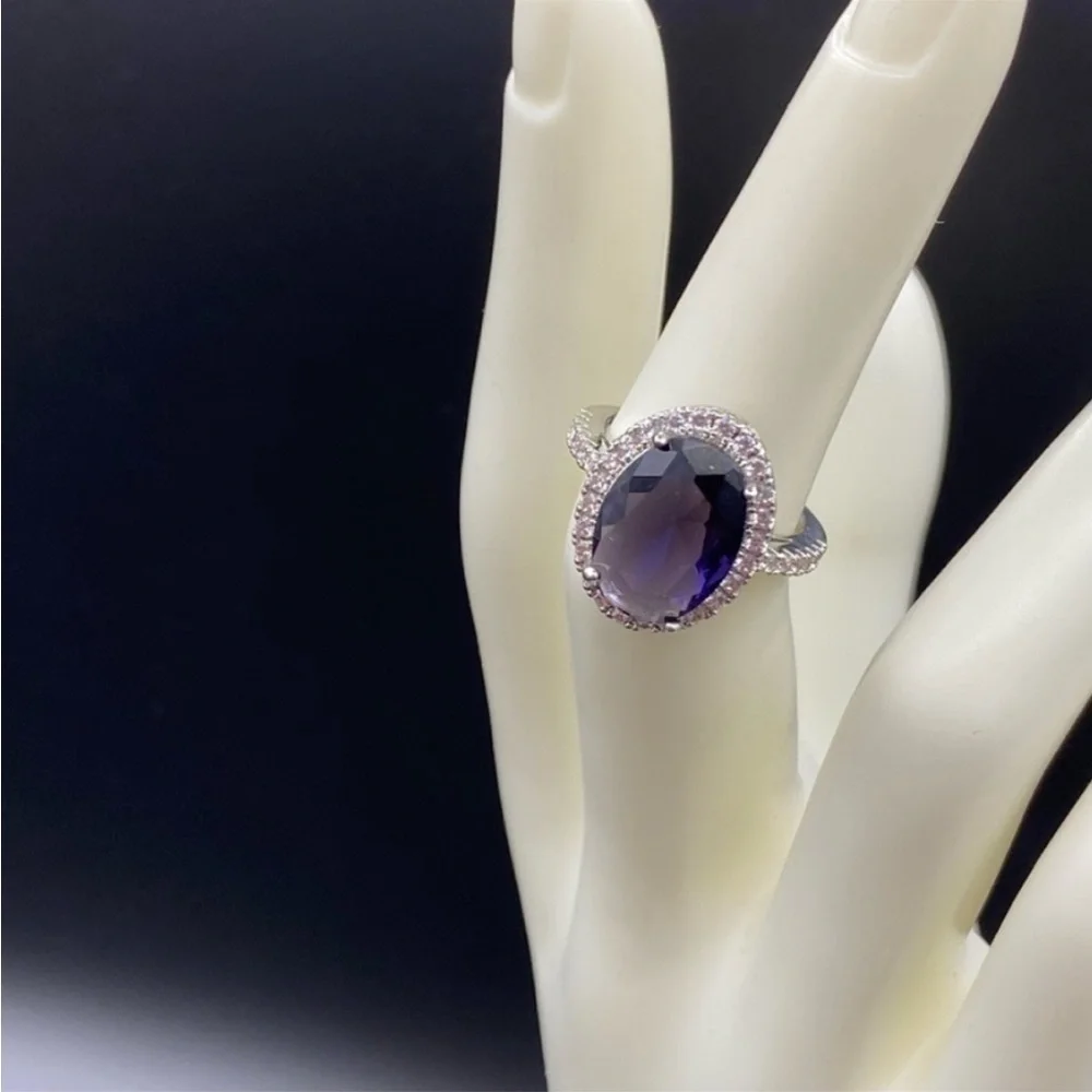 Sterling Silver amethyst prong set cocktail ring with gemstone halo bezel